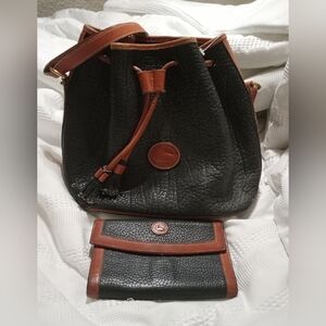 Dooney and Bourke genuine leather handbag and wallet
